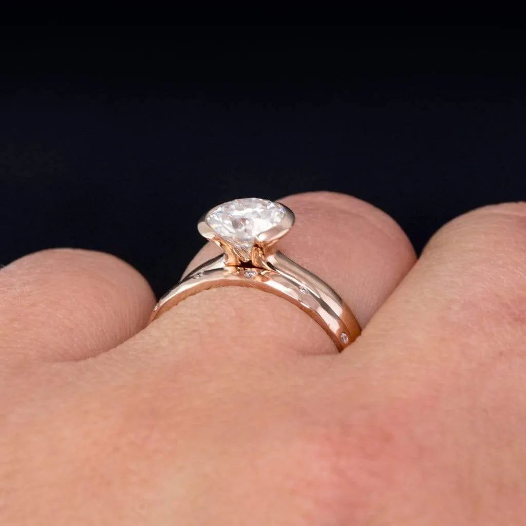 Round Brilliant Moissanite Modified Tension Solitaire Engagement Ring